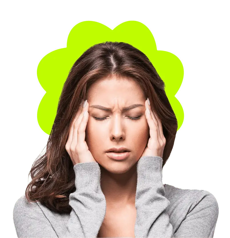 Woman holding her head as if she has a headache